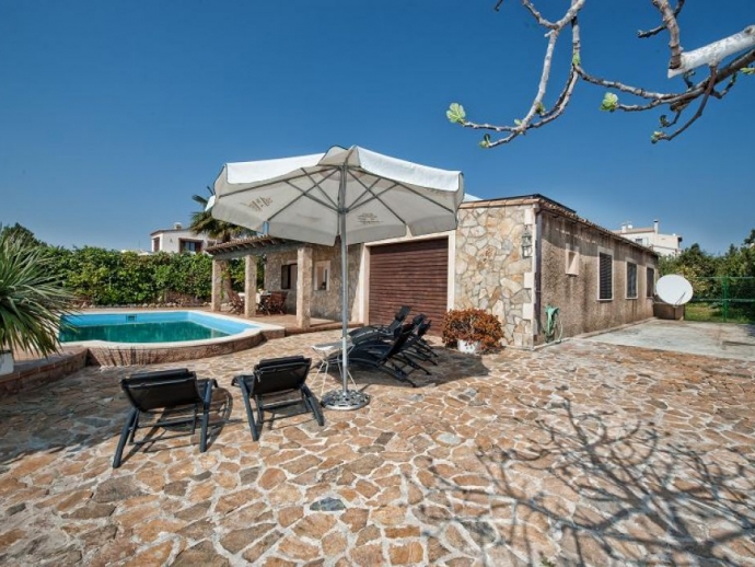 Pool Area with Sunloungers and Umbrella