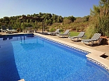 Pool area with sunloungers