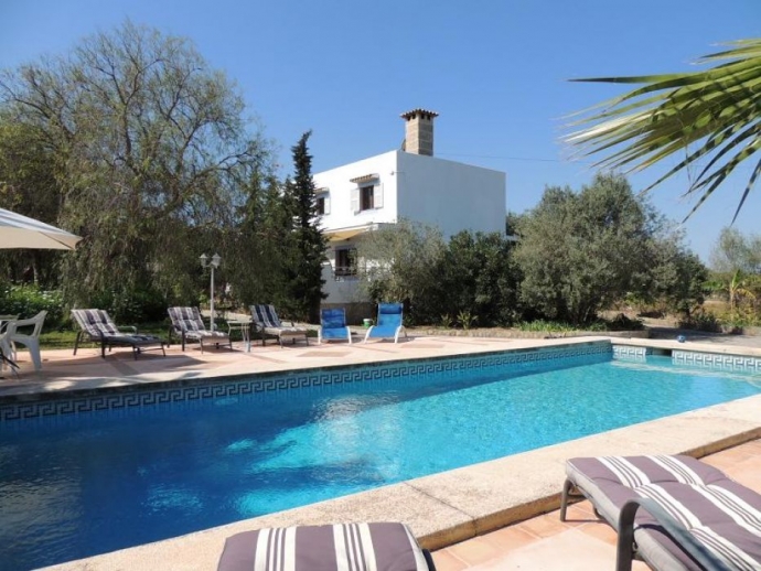 Pool area with sunloungers