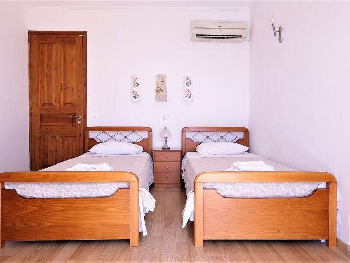 Twin Bedroom with Air Conditioning