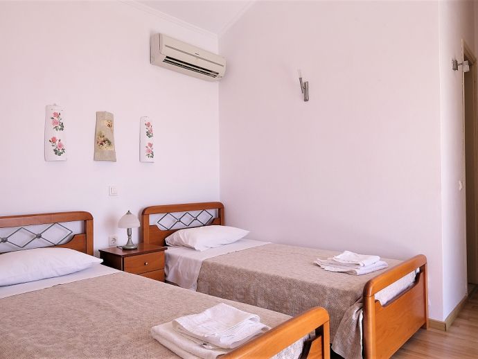 Twin Bedroom with Air Conditioning