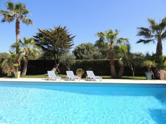 Pool area with sunloungers