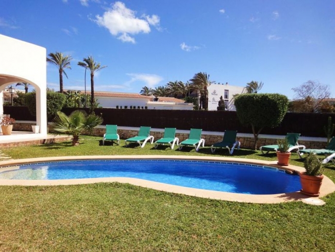 Pool area with sunloungers