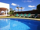 Pool area with sunloungers